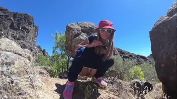 Piss piss travel young girl tourist peeing in the mountains gran ca