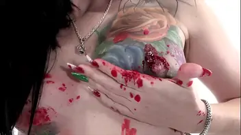 Tattooed black beauty fingering herself to orgasm